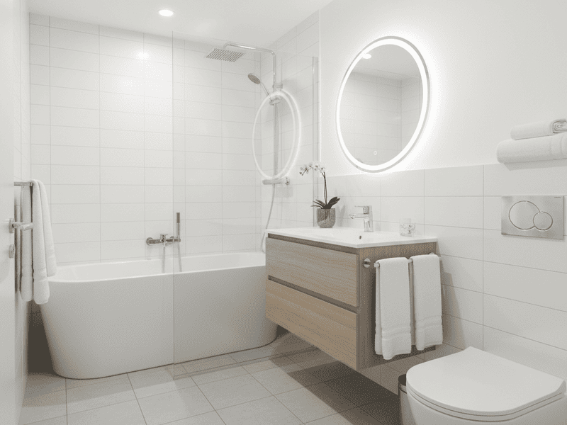 Cleaner scrubbing bathroom tiles and fittings